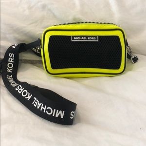 Neon Michael Kors cross body bag.